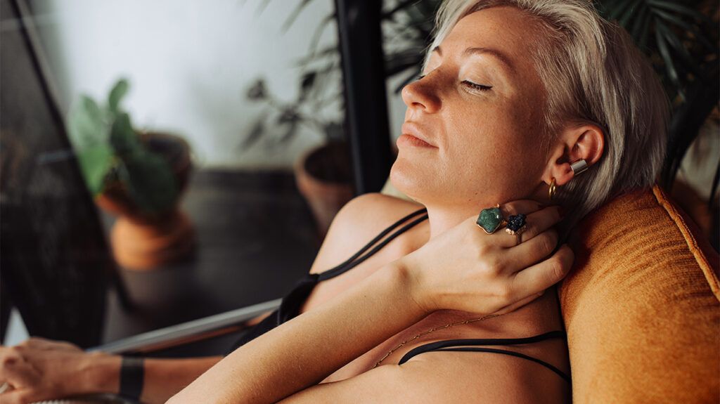 Woman relaxing in chair with eyes closed