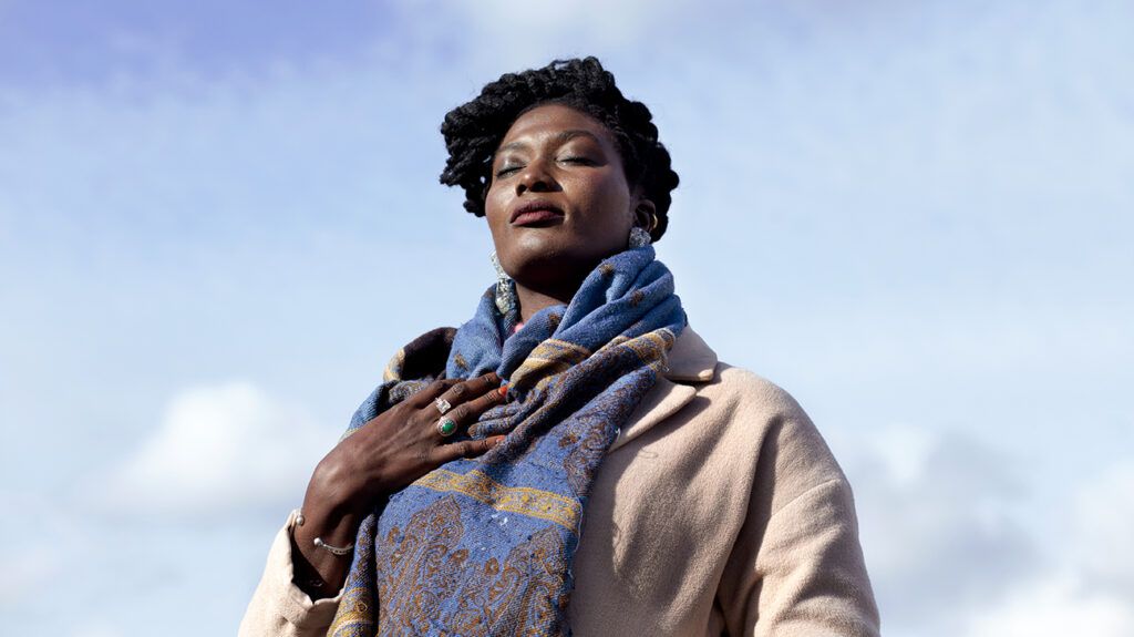 Young Black woman with her eyes closed