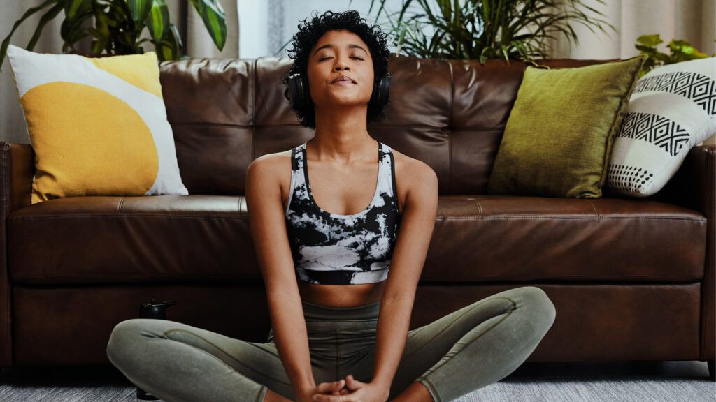 Woman meditating using an app